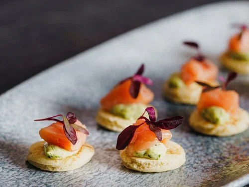Salmon canapés elegantly plated